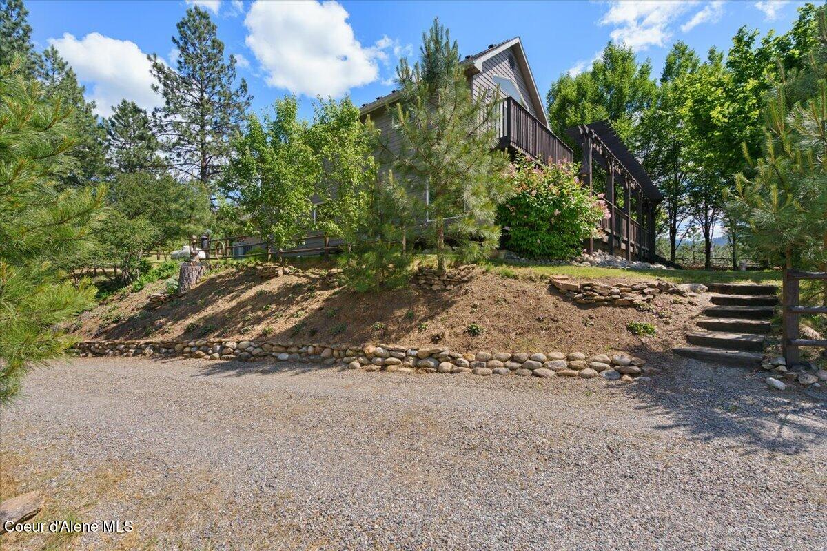 16289 West Summerfield Road Post Falls, ID 83854 - Photo 42 of 66 lower rd west side of the home