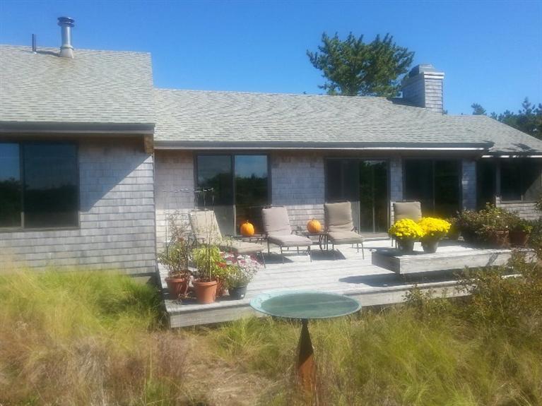 10 Turnstone Road Truro, MA 02666 - Photo 20 of 29 a view of a house with pool and chairs