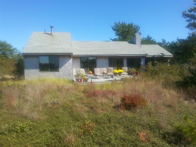 10 Turnstone Road Truro, MA 02666 - Photo 2 of 29 a front view of a house with garden