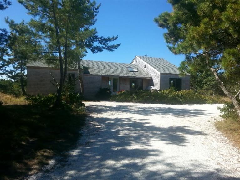 10 Turnstone Road Truro, MA 02666 - Photo 21 of 29 a front view of a house with a garden