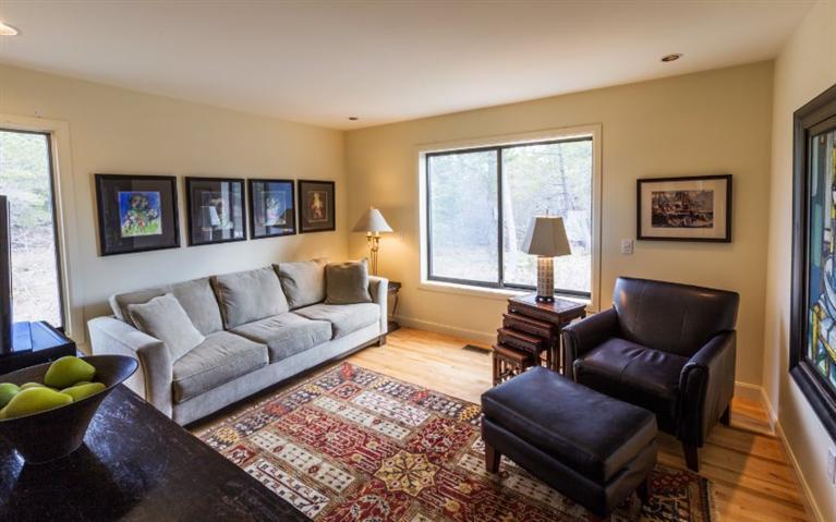 10 Turnstone Road Truro, MA 02666 - Photo 25 of 29 a living room with furniture and a large window