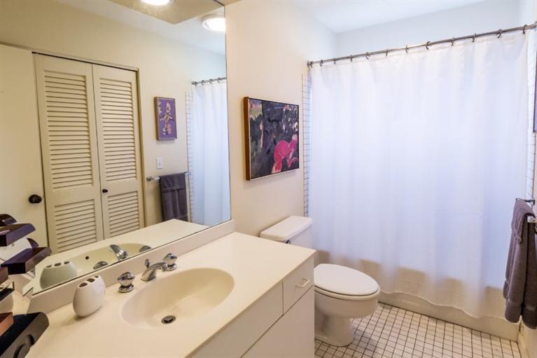 10 Turnstone Road Truro, MA 02666 - Photo 26 of 29 a bathroom with a sink and a mirror