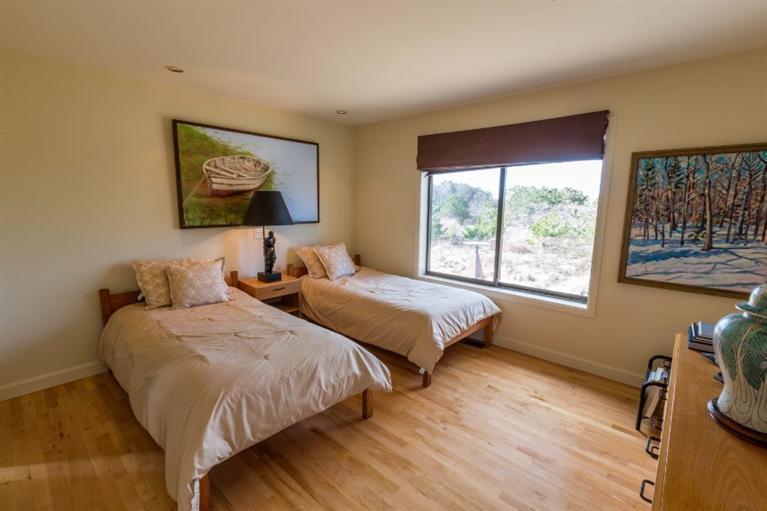 10 Turnstone Road Truro, MA 02666 - Photo 28 of 29 a bedroom with two beds and a large window