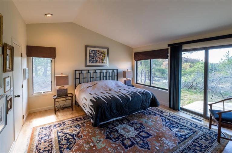 10 Turnstone Road Truro, MA 02666 - Photo 8 of 29 a bedroom with a large bed and a window