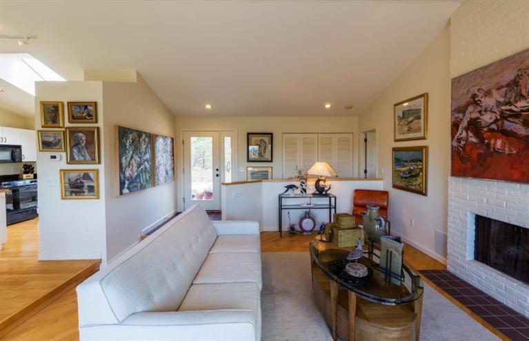 10 Turnstone Road Truro, MA 02666 - Photo 10 of 29 a living room with furniture and a fireplace