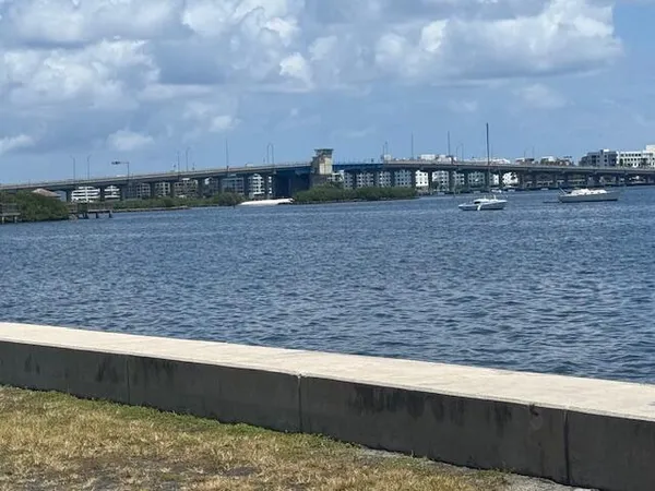 a view of a lake with a yard