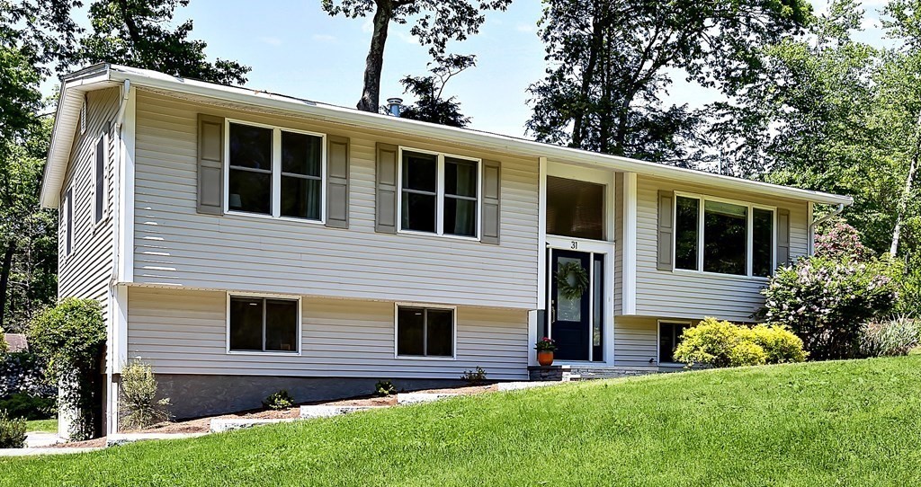 31 Tall Tree Road Sharon, MA 02067 - Photo 1 of 24 a front view of house with yard