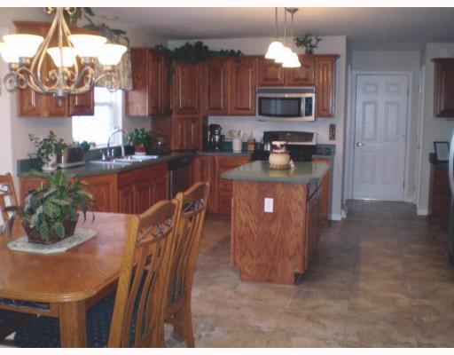 124 Bocktown Road Aliquippa, PA 15001 - Photo 3 of 18 Kitchen. Gorgeous eat-in kitchen, plenty of cabinet space, storage in island and pantry. First floor laundry right off kitchen and attached garage directly through door.