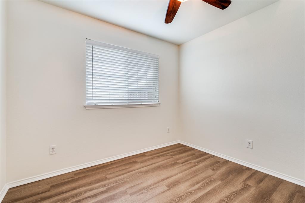 1012 Barbara Street Denton, TX 76209 - Photo 17 of 23 an empty room with a empty space and a window