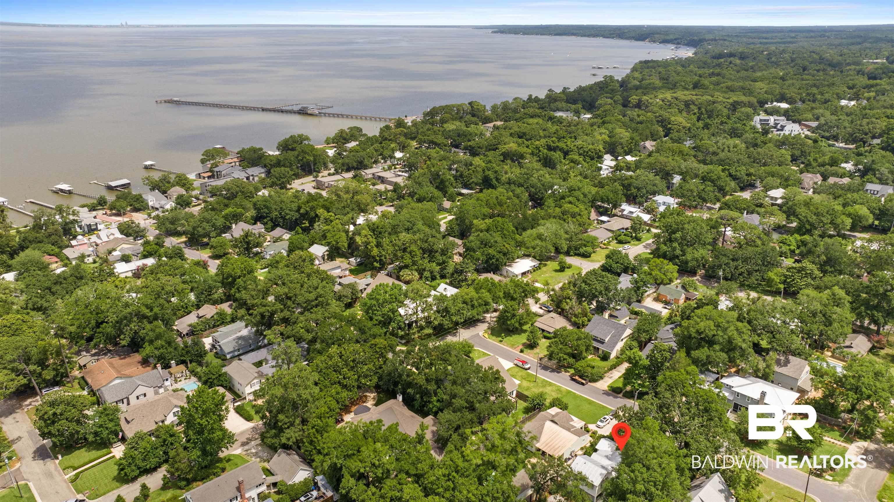 106 White Avenue Fairhope, AL 36532 - Photo 32 of 35 Aerial view of property and surrounding area with a nearby body of water and nearby suburban area