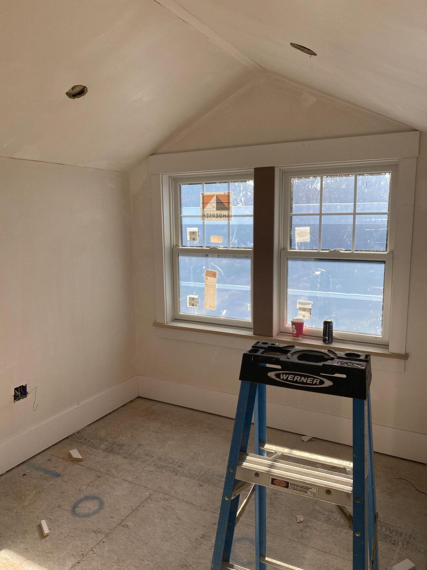 33 Running Light Way Mashpee, MA 02649 - Photo 10 of 11 a room with a window and a projector screen