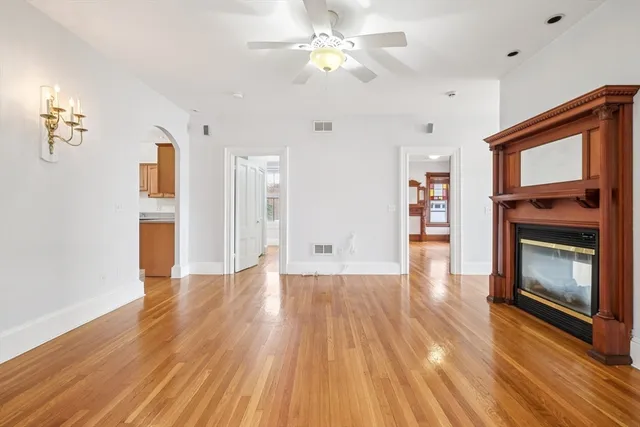 a view of a livingroom with wooden floor