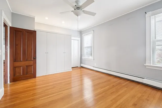 a front view of residential houses with yard