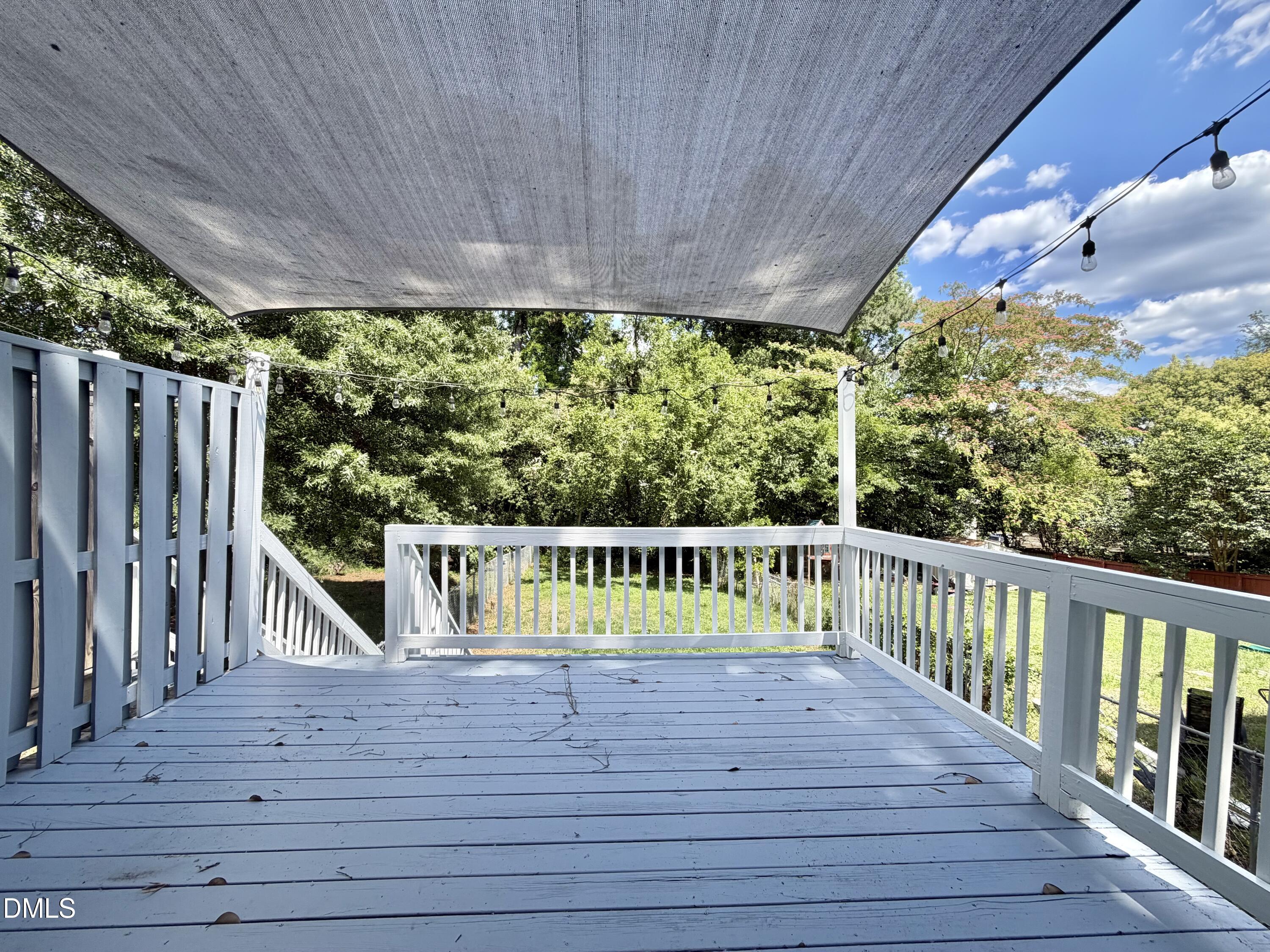 333 Jones Franklin Road, Unit B Raleigh, NC 27606 - Photo 7 of 9 a view of deck with furniture and garden