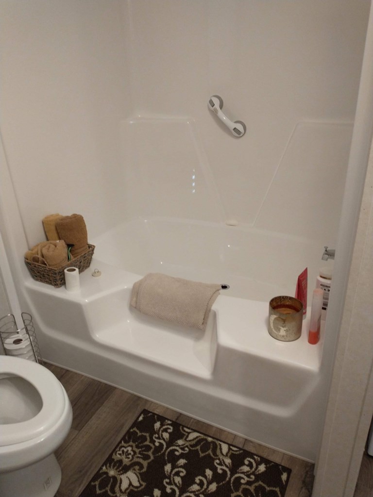 2438 Ridge Road Pigeon Forge, TN 37863 - Photo 21 of 37 a bathroom with a sink and a toilet