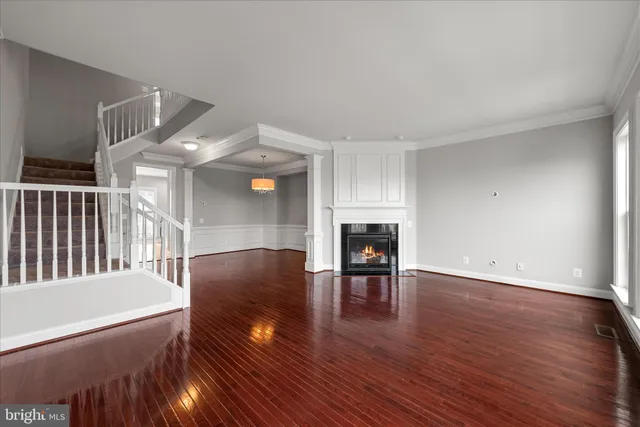 a view of livingroom with furniture and a fireplace