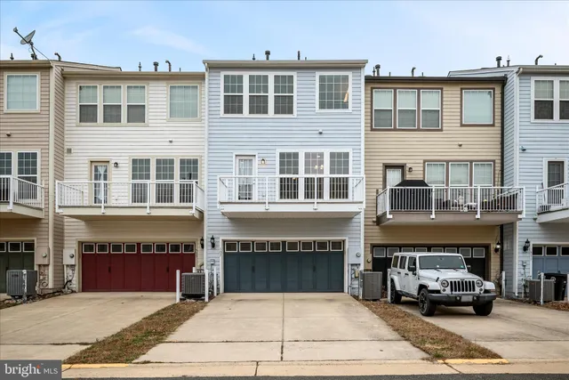 an aerial view of a yard with horses