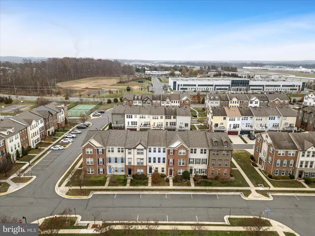 an aerial view of residential building with outdoor space