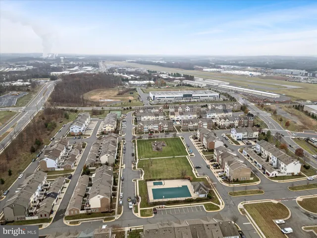 an aerial view of residential building with outdoor space