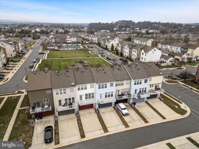 a picture of a bench in front of a wall
