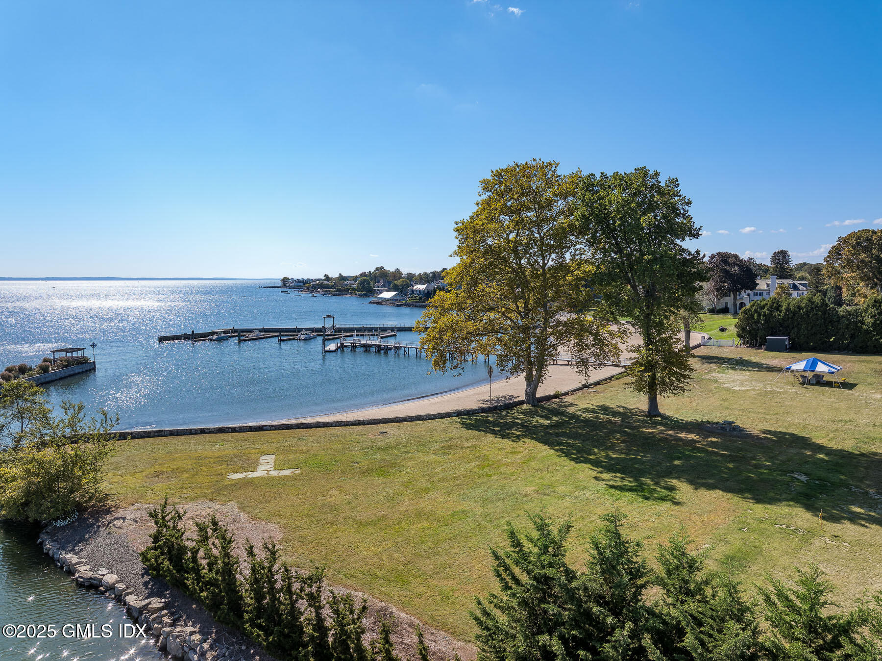 50 Signal Road Stamford, CT 06902 - Photo 9 of 15 a view of a lake with a building in the background