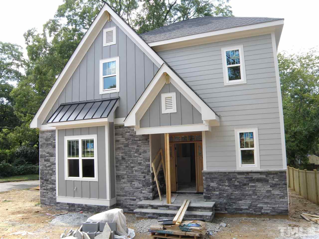 701 Latta Street Raleigh, NC 27607 - Photo 1 of 1 a view of a house with a yard and sitting space