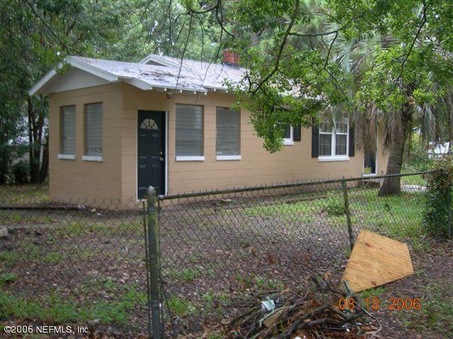 1840 Prospect Street Jacksonville, FL 32208 - Photo 3 of 9 a house with trees in the background