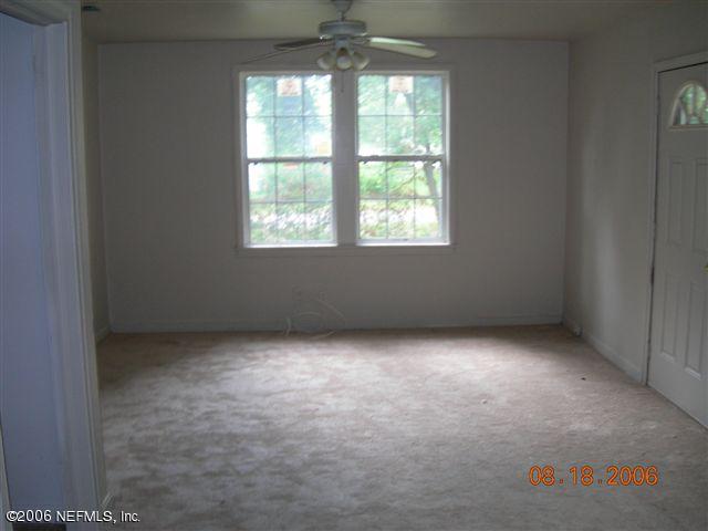 1840 Prospect Street Jacksonville, FL 32208 - Photo 8 of 9 an empty room with a window