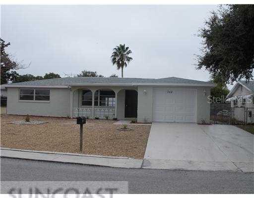 7414 Abalone Drive Port Richey, FL 34668 - Photo 1 of 1 front view of a house
