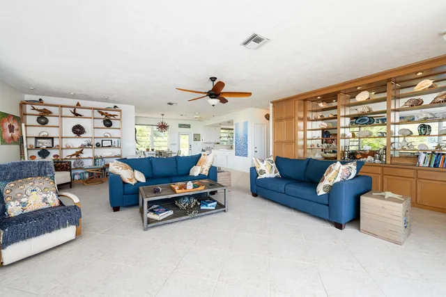 a bed room with a bed and a television