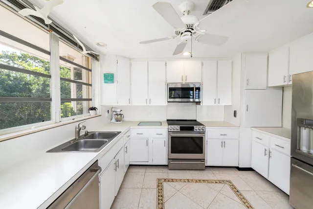 a bedroom with a bed and a cabinets