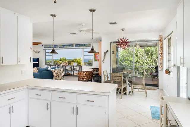 a spacious bedroom with a bed and furniture