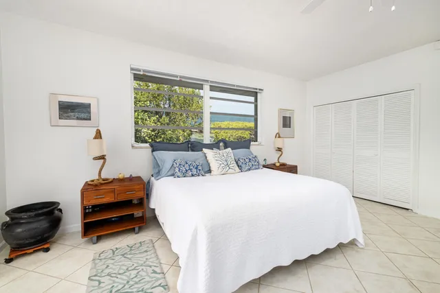 a view of a golf course with an ocean view