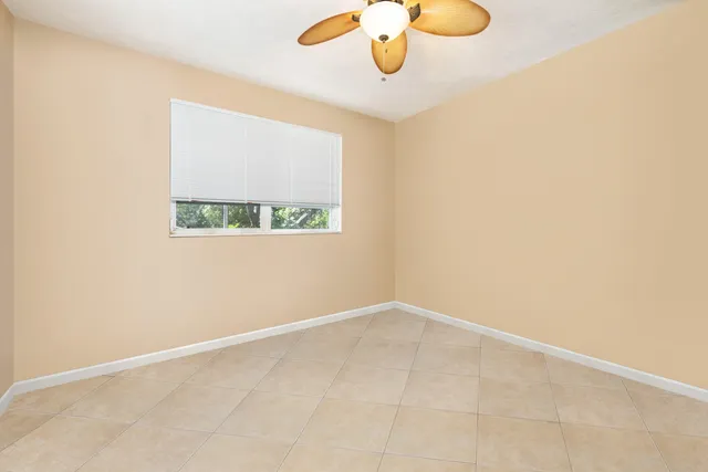 a picture of a bathroom with a shower