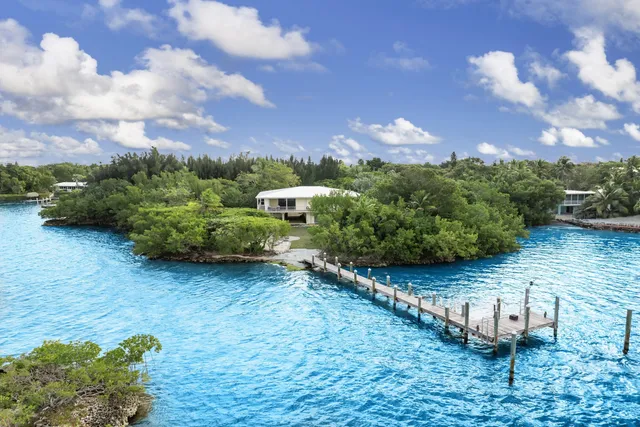 a view of a garden with sitting area