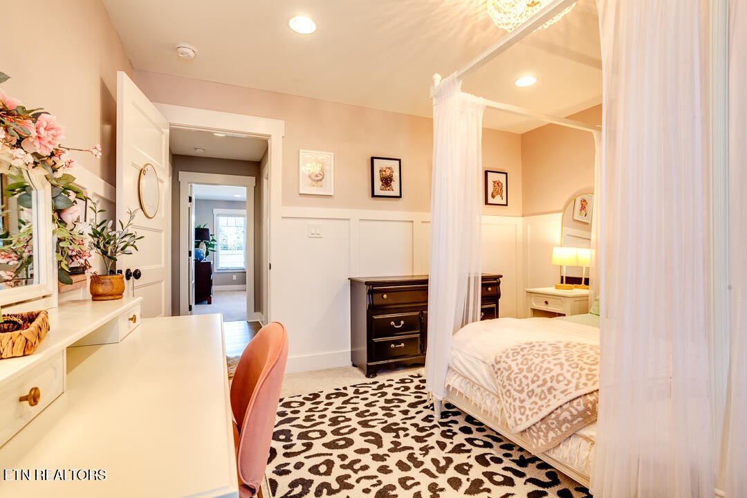 6015 Cate Road Powell, TN 37849 - Photo 37 of 60 a bedroom with a bed and wooden floor