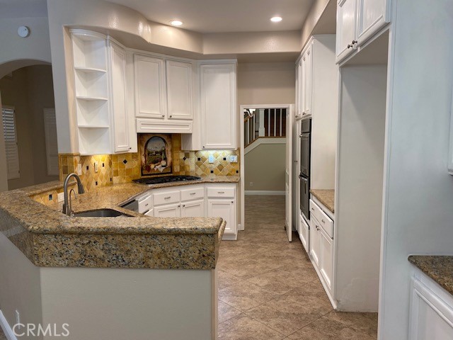 2522 Tequestra Tustin, CA 92782 - Photo 12 of 19 a kitchen with sink refrigerator and window