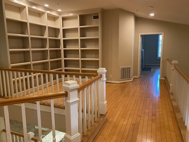 2522 Tequestra Tustin, CA 92782 - Photo 14 of 19 a view of a hallway with wooden floor and entryway