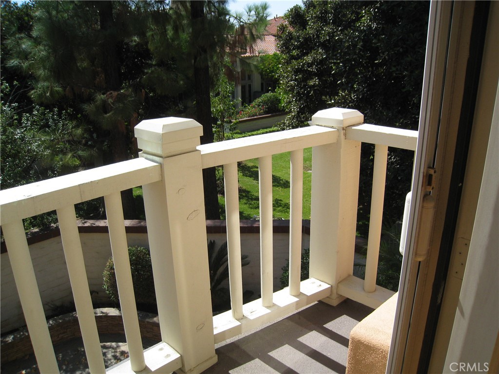 2522 Tequestra Tustin, CA 92782 - Photo 18 of 19 a view of a porch with wooden floor and yard