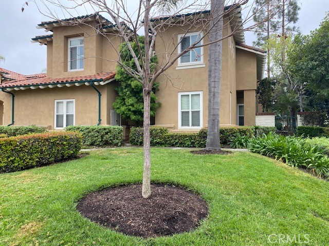 2522 Tequestra Tustin, CA 92782 - Photo 2 of 19 a house that has a lot of plants in it