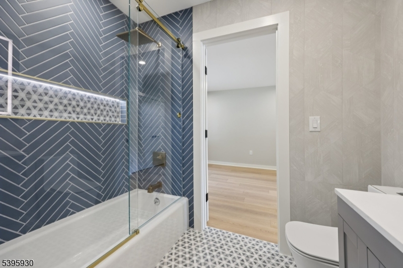 12 Rocky Point Road West Milford, NJ 07421 - Photo 23 of 50 a bathroom with a bathtub and a shower