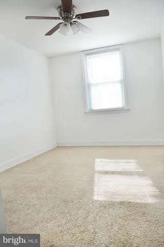 a view of a window in an empty room
