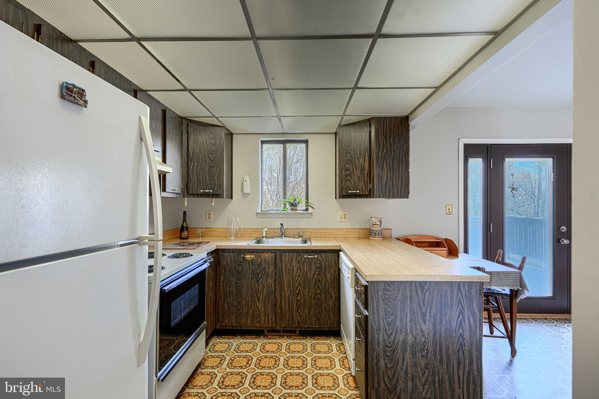 2 Romanoff Court Baltimore, MD 21234 - Photo 11 of 34 a kitchen with a sink appliances and cabinets