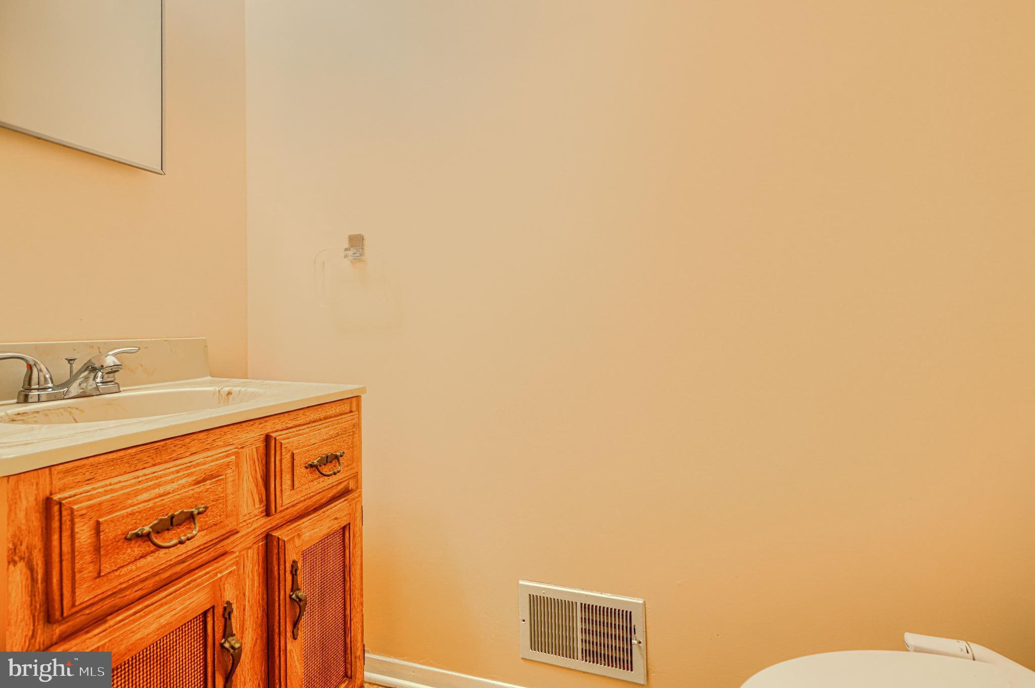 2 Romanoff Court Baltimore, MD 21234 - Photo 12 of 34 a bathroom with a sink and a toilet