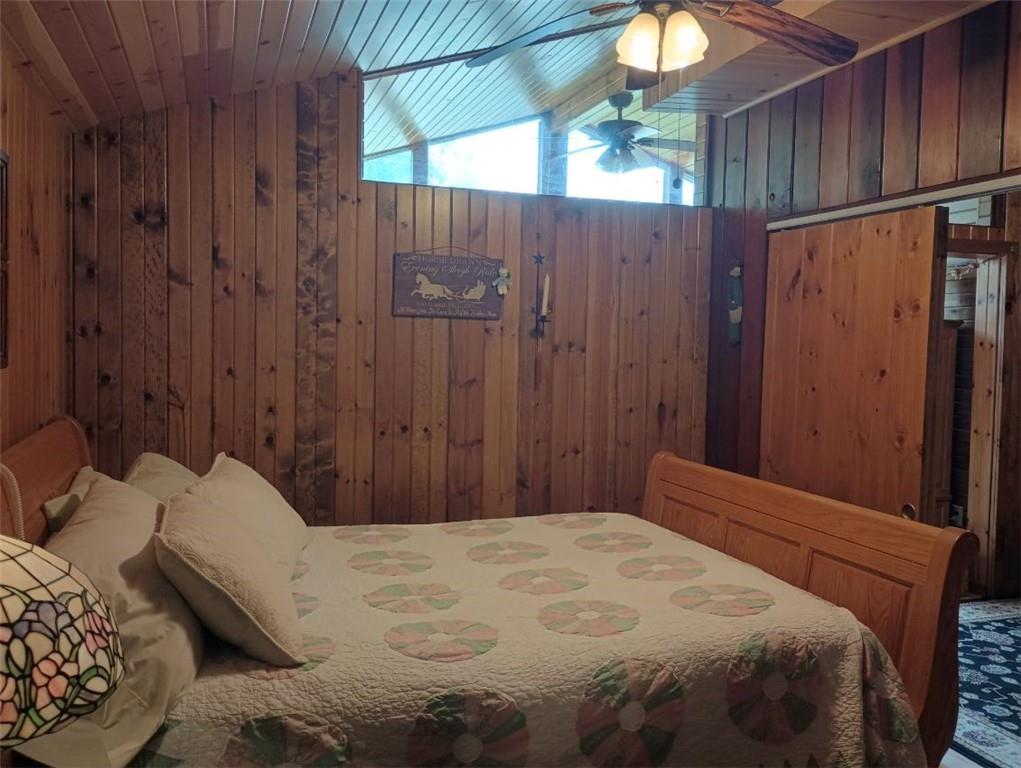 8473 South Lake Road Jamestown, PA 16134 - Photo 13 of 21 a bedroom with a bed and a window