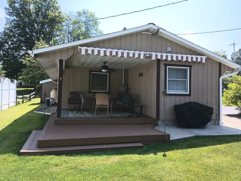 8473 South Lake Road Jamestown, PA 16134 - Photo 18 of 21 a front view of a house with a yard