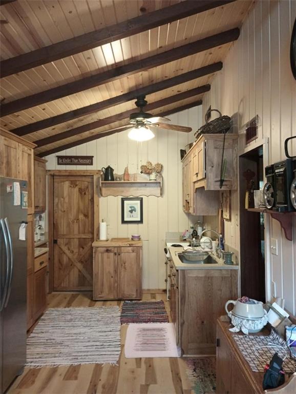 8473 South Lake Road Jamestown, PA 16134 - Photo 5 of 21 a kitchen with refrigerator and cabinets