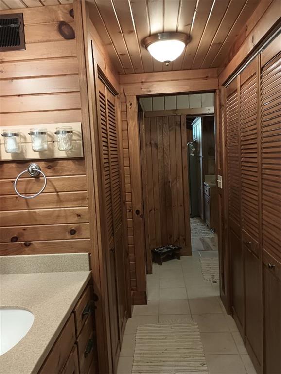 8473 South Lake Road Jamestown, PA 16134 - Photo 10 of 21 a bathroom with a sink and a mirror