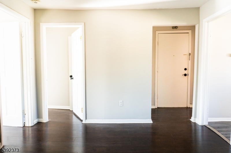 5 Elm Street, Unit 4 Newark, NJ 07102 - Photo 7 of 11 a view of a hallway with wooden floor