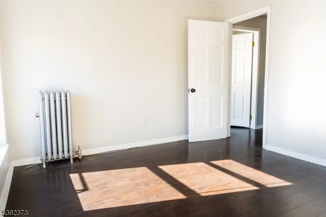 an entryway with a rug